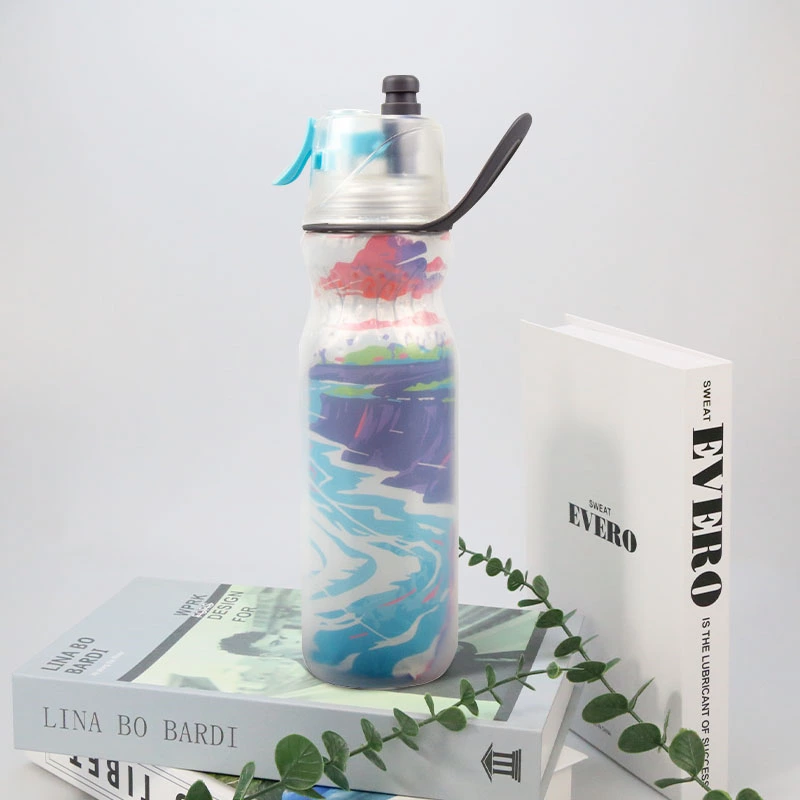 Cycling water bottle with spray lid